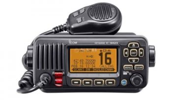Fixed marine VHF radio with DSC controls and a hand microphone