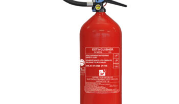 Red portable fire extinguisher with hose, operating handle and identification label